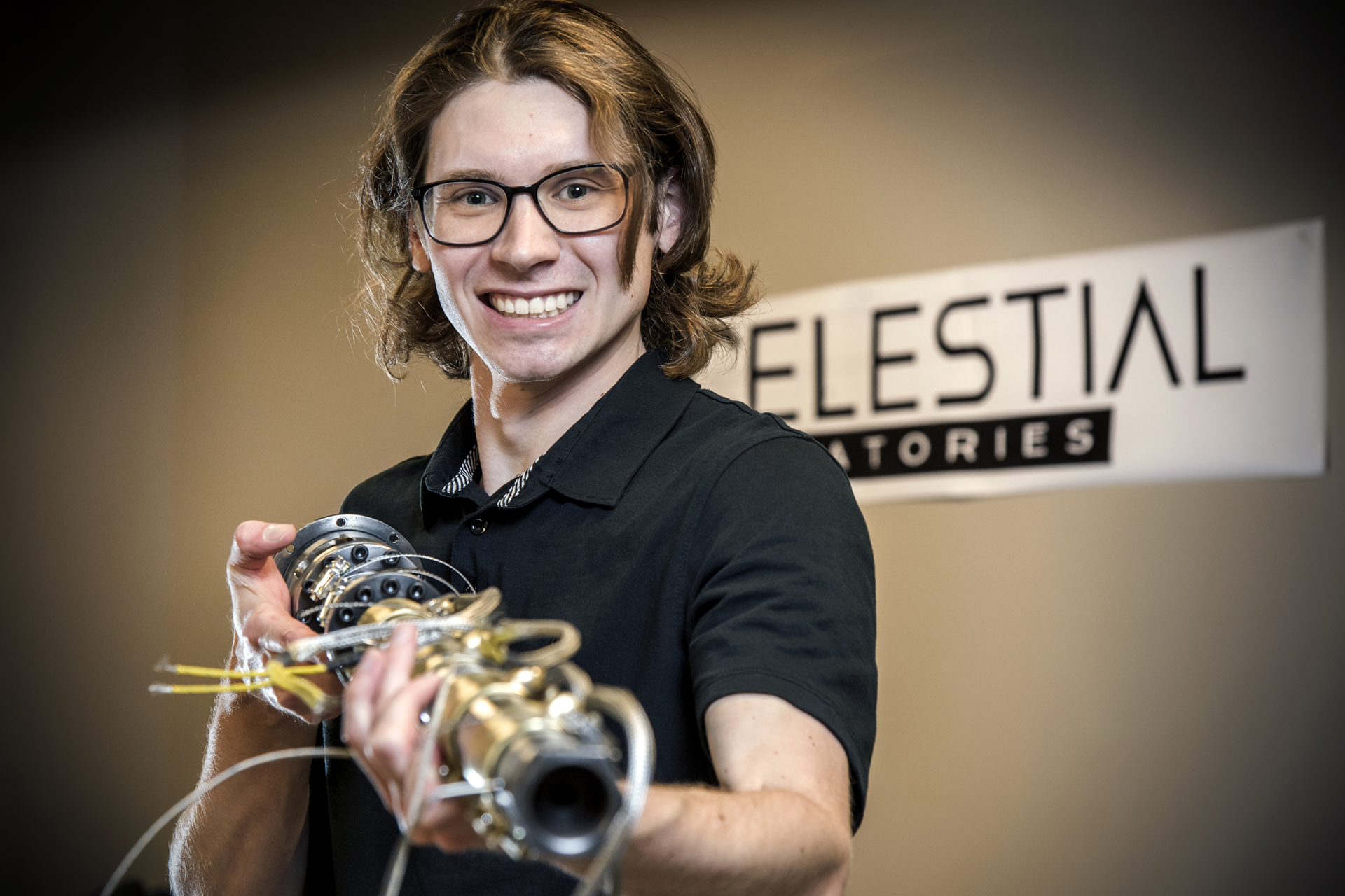 Wil Norton with the team's polymour extruder barrel. (Photo by Trevor Hopkin)