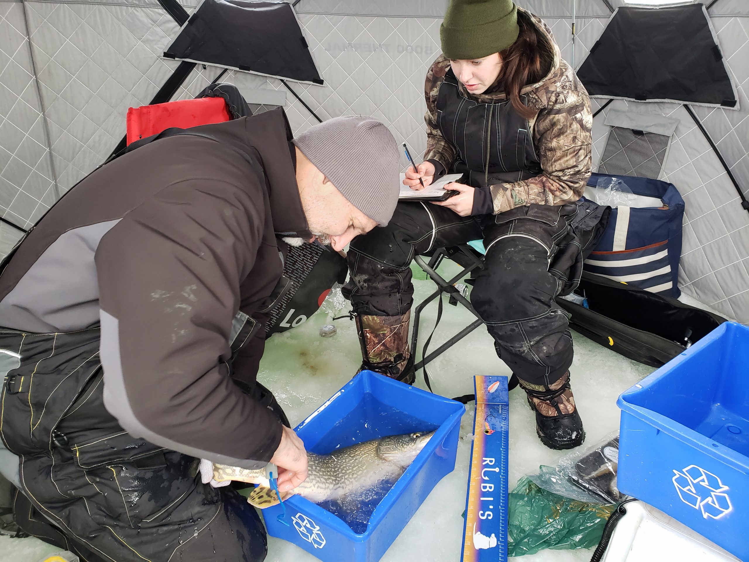 MyCatch, a new app that allows Saskatchewan anglers to share valuable fish data, is helping researchers like U of R biology professor Chris Somers (left) and graduate student Shayna Hamilton learn more about Saskatchewan fish stocks and the waterways they call home. (Photo courtesy of Chris Somers)