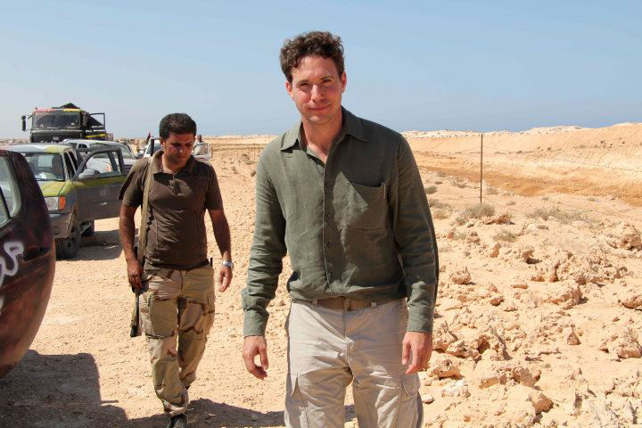 Brian McQuinn in 2011 with insurgents outside of Sirte, Libya. (Photo by Mohammed Amer) 