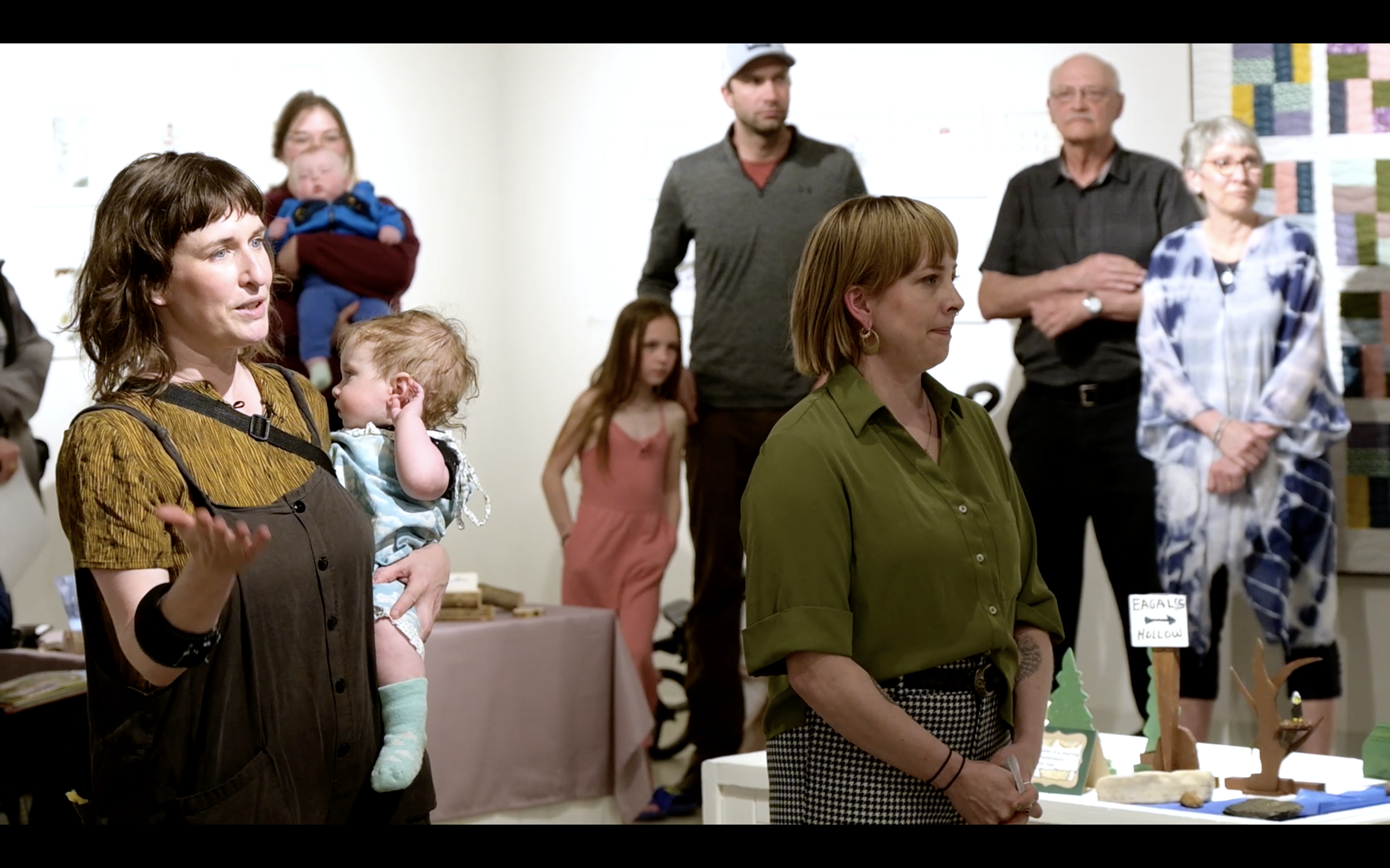 2023-BWYFY-Reception-GDAG-Amber-Lumi-Alana Amber Phelps Bondaroff, Lumi, and Alana Moore addressing the audience at the Belong Where You Find Yourself reception at the Godfrey Dean Art Gallery, May 2023. (Photo by Adrienne Adams)