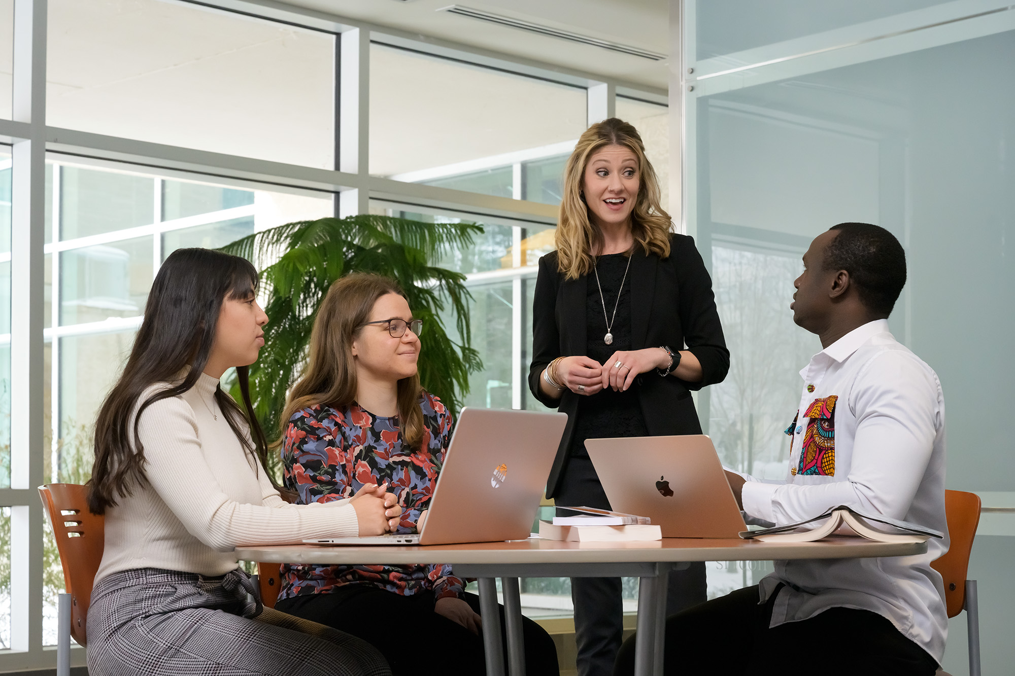 Dr. Amber Fletcher with her graduate research assistants, (l to r) Erin Hillis, Gabriela Beltran, and Abraham Bugre. (Photo by Trevor Hopkin)