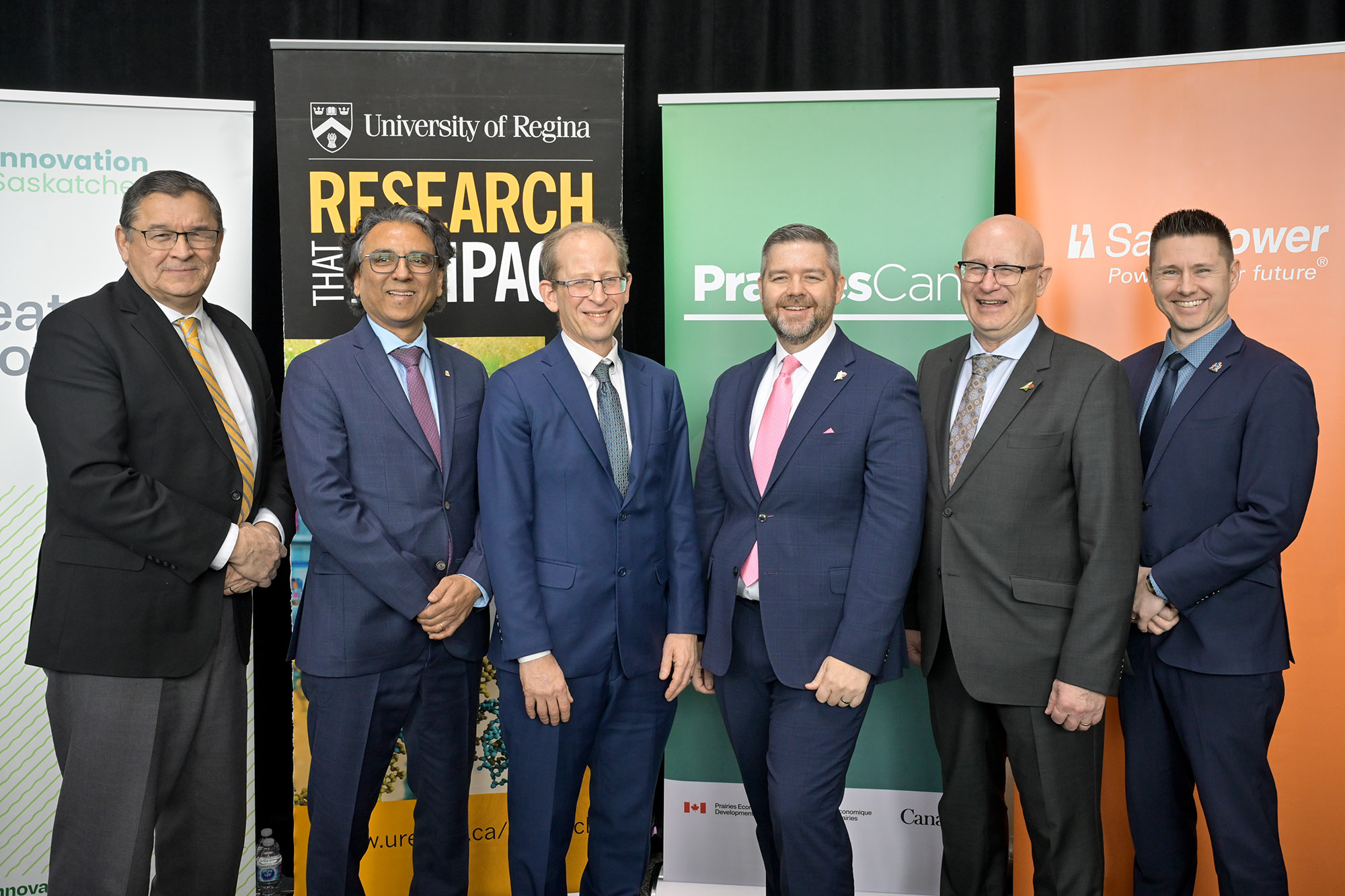 New funding and support was announced to create the Small Modular Reactor – Safety, Licensing and Testing (SMR-SLT) Centre at the U of R. (L to r): The Honourable Buckley Belanger, Secretary of State for Rural Development; Rupen Pandya, SaskPower President and CEO; Dr. Jeff Keshen, U of R President and Vice Chancellor;  
The Honourable Jeremy Harrison, Minister of Crown Investments Corporation and Minister Responsible for SaskPower;
The Honourable Warren Kaeding, Minister of Trade & Export Development, Minister Responsible for Innovation; His Worship Chad Bachynski, Mayor of Regina. (Photo by Trevor Hopkin)
