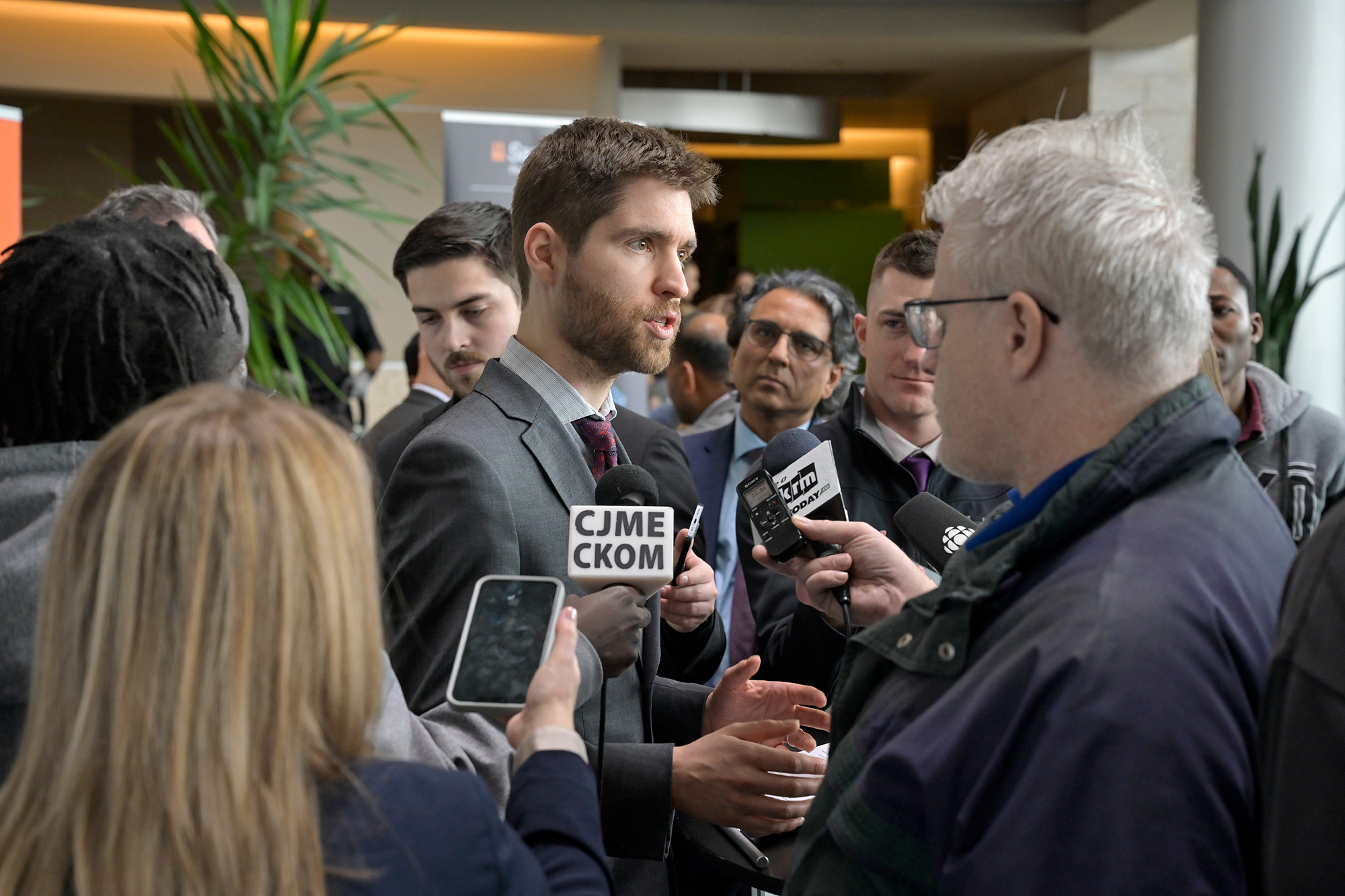 Dr. Arthur Situm being interviewed at Monday's announcement. (Photo by Trevor Hopkin)