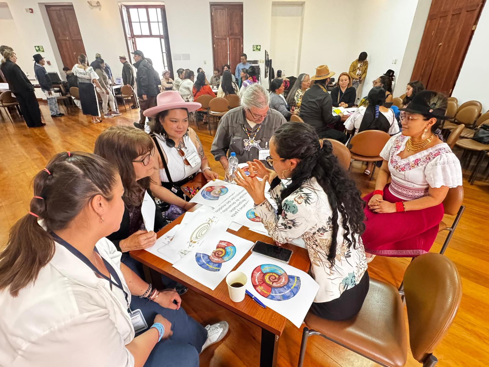 Student Taneesha Herbert (in the pink hat) participating in a dialogue circle.  (Photo courtesy of Amawtay Wasi University)